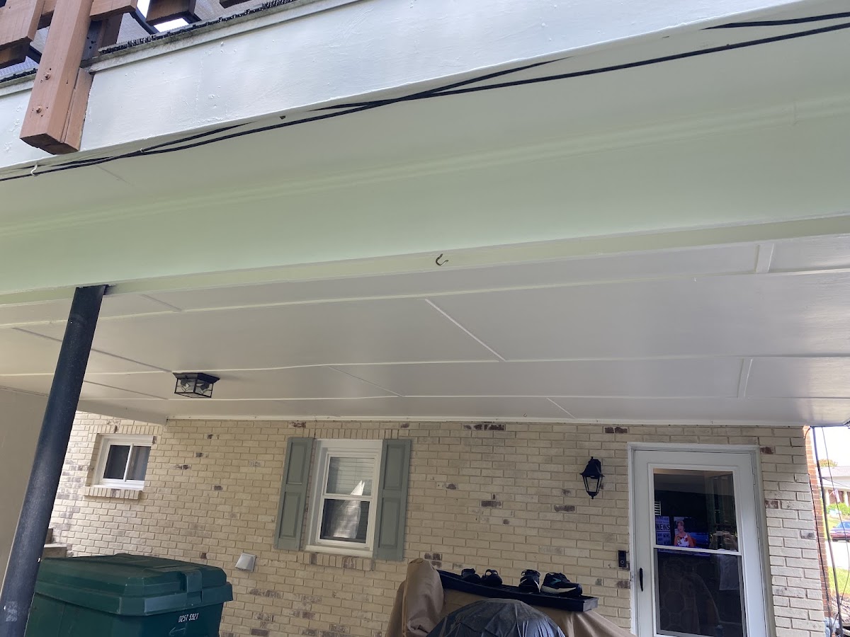 Freshly painted white underside of a deck